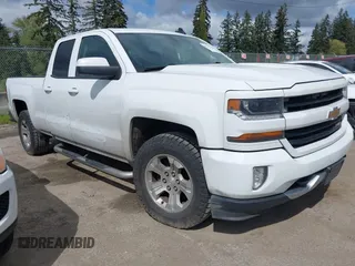 2017 Chevrolet Silverado 1500 LT with VIN 1GCVKREC7HZ131196, listed as a IAAI auction lot 42072336 with 158,140 mi miles. Bid and sale history available at carsss.com. Image 1.