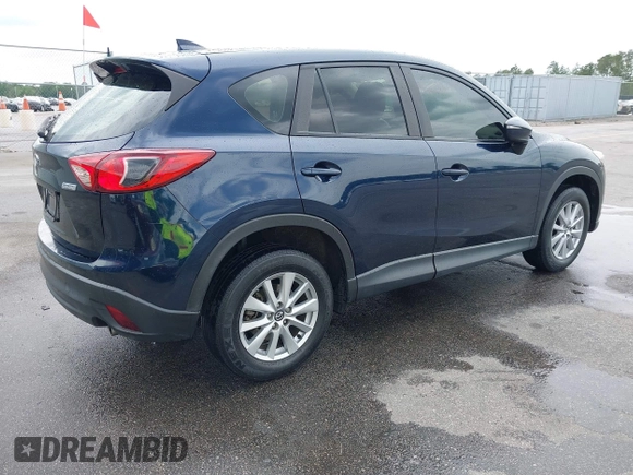 2016 Mazda CX-5 Sport with VIN JM3KE2BY0G0850298, listed as a IAAI auction lot 42107007 with 97,478 mi miles. Bid and sale history available at carsss.com. Image 4.