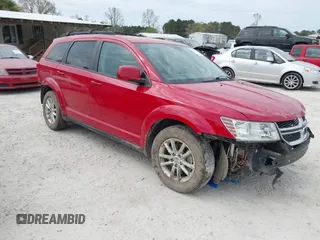 2014 Dodge Journey SXT z VIN 3C4PDCBB3ET153212, wystawiony jako IAAI lot #41897261 z przebiegiem 151 439 mil mil oraz . Historia ofert i sprzedaży dostępna na DreamBid. Obrazek 1.