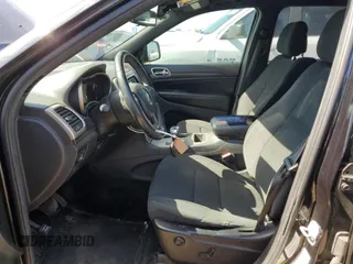 2014 Jeep Grand Cherokee Laredo with VIN 1C4RJFAG0EC242229, listed as a Copart auction lot 53300335 with 191,209 mi miles and Salvage Title. Bid and sale history available at DreamBid. Image 7.
