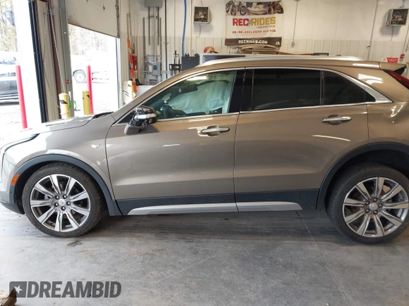 2020 Cadillac XT4 AWD Premium Luxury with VIN 1GYFZDR49LF015590, listed as a IAAI auction lot 41606564 with 47,795 mi miles and . Bid and sale history available at carsss.com. Image 14.