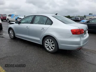 2013 Volkswagen Jetta SE with VIN 3VWDP7AJ9DM448489, listed as a Copart auction lot 62683725 with 178,931 mi miles and Salvage title. Bid and sale history available at DreamBid. Image 2.