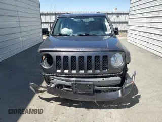 2014 Jeep Patriot Sport with VIN 1C4NJRBB7ED886081, listed as a Copart auction lot 52406205 with 61,002 mi miles and Salvage Title. Bid and sale history available at DreamBid. Image 5.