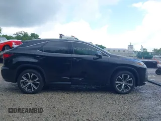 2017 Lexus RX 350 z VIN 2T2BZMCAXHC125529, wystawiony jako IAAI lot #42625326 z przebiegiem 97 503 mil mil oraz . Historia ofert i sprzedaży dostępna na DreamBid. Obrazek 14.