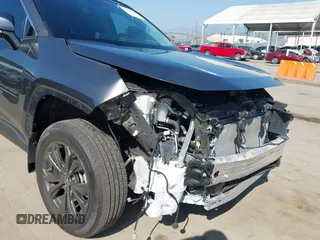 2024 Toyota RAV4 Hybrid XLE Premium with VIN 2T3B6RFV5RW058841, listed as a IAAI auction lot 41992425 with 22,073 mi miles and . Bid and sale history available at DreamBid. Image 6.