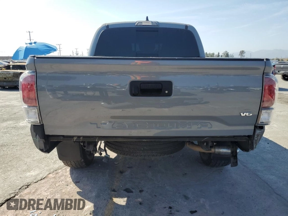 2020 Toyota Tacoma SR5 with VIN 3TMAZ5CN2LM137991, listed as a Copart auction lot 60317895 with 98,054 mi miles and Salvage title. Bid and sale history available at DreamBid. Image 6.