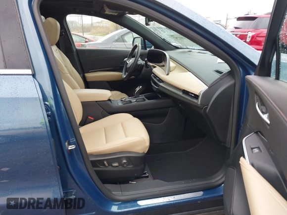 2024 Cadillac XT4 AWD Premium Luxury with VIN 1GYFZDR45RF143981, listed as a IAAI auction lot 42032787 with 14,700 mi miles and . Bid and sale history available at DreamBid. Image 5.