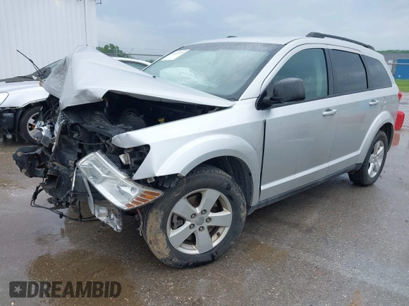 2013 Dodge Journey Canada Value z VIN 3C4PDCABXDT563439, wystawiony jako IAAI lot #42227899 z przebiegiem 213 199 mil mil oraz . Historia ofert i sprzedaży dostępna na DreamBid. Obrazek 2.