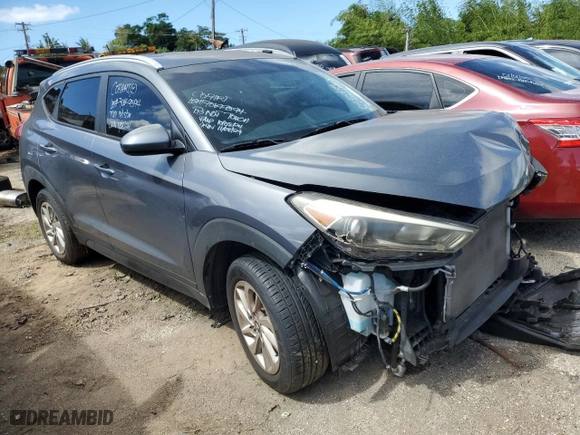 2016 Hyundai Tucson SE with VIN KM8J3CA49GU107271, listed as a Copart auction lot 70699594 with 0 mi miles and Salvage Title. Bid and sale history available at carsss.com. Image 4.