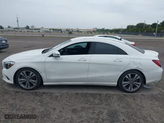2019 Mercedes-Benz CLA with VIN WDDSJ4EB8KN749874, listed as a IAAI auction lot 41653051 with 56,286 mi miles. Bid and sale history available at carsss.com. Image 14.