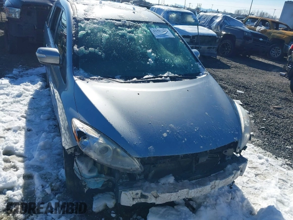 2014 Mazda 5 Sport with VIN JM1CW2BLXE0168119, listed as a IAAI auction lot 41527688 with 142,357 mi miles and . Bid and sale history available at DreamBid. Image 12.