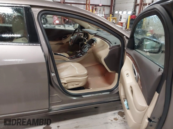 2012 Buick LaCrosse Premium 1 with VIN 1G4GE5G36CF134893, listed as a IAAI auction lot 41804828 with 165,735 mi miles and . Bid and sale history available at DreamBid. Image 5.