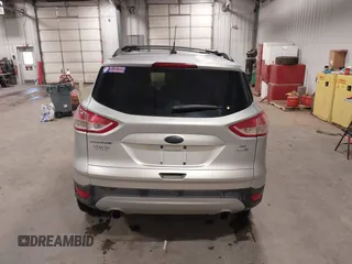 2013 Ford Escape SE with VIN 1FMCU9GX7DUB89197, listed as a IAAI auction lot 42311546 with 131,263 mi miles and . Bid and sale history available at DreamBid. Image 17.