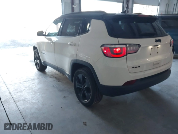 2018 Jeep Compass Altitude with VIN 3C4NJDBB4JT395992, listed as a IAAI auction lot 41318649 with 88,887 mi miles and . Bid and sale history available at carsss.com. Image 3.