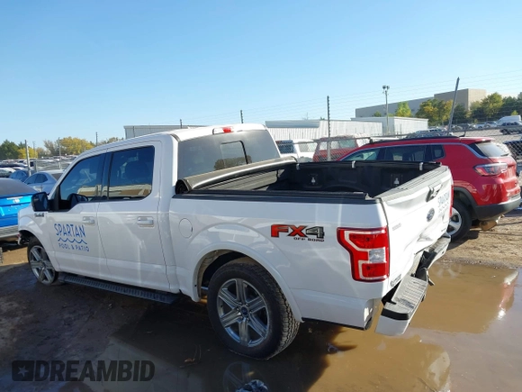 2018 Ford F-150 XL with VIN 1FTEW1EG1JKE29623, listed as a IAAI auction lot 40615703 with 122,846 mi miles and . Bid and sale history available at DreamBid. Image 14.