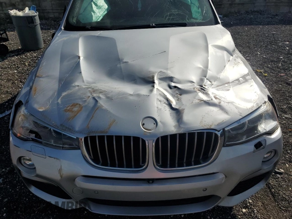 2017 BMW X4 M40i with VIN 5UXXW7C51H0U25511, listed as a Copart auction lot 77492894 with 94,003 mi miles and Salvage Title. Bid and sale history available at carsss.com. Image 12.
