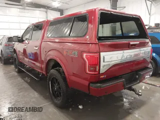 2015 Ford F-150 XLT with VIN 1FTEW1EG5FFB90898, listed as a IAAI auction lot 41617424 with 128,587 mi miles. Bid and sale history available at carsss.com. Image 3.