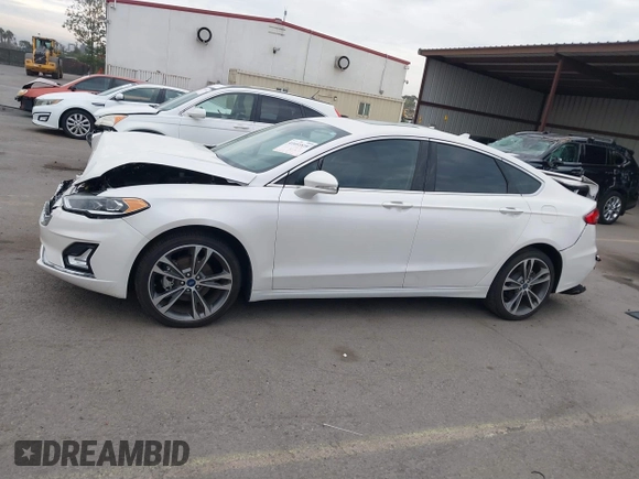 2020 Ford Fusion Titanium with VIN 3FA6P0K92LR103416, listed as a IAAI auction lot 41681810 with 54,902 mi miles and . Bid and sale history available at DreamBid. Image 14.