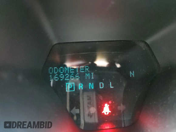 2015 Chevrolet Traverse LT с VIN 1GNKRHKD5FJ127625, выставлен на аукционе Copart как лот 58220065 с пробегом 169 266 миль миль и Списание • Salvage title. История ставок и продаж доступна на DreamBid. Изображение 9.