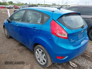 2013 Ford Fiesta SE with VIN 3FADP4EJ0DM158451, listed as a IAAI auction lot 42083743 with 111,919 mi miles. Bid and sale history available at carsss.com. Image 3.