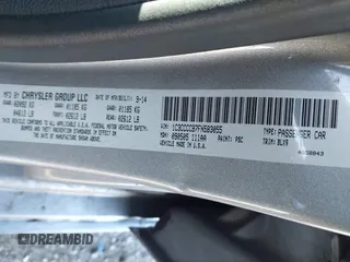 2015 Chrysler 200 C with VIN 1C3CCCCB7FN583055, listed as a IAAI auction lot 42062923 with 105,810 mi miles. Bid and sale history available at carsss.com. Image 9.