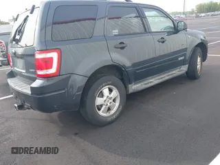 2008 Ford Escape XLT with VIN 1FMCU93148KC14236, listed as a IAAI auction lot 41846221 with 187,443 mi miles. Bid and sale history available at carsss.com. Image 4.