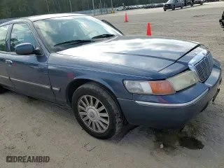 2011 Mercury Grand Marquis LS with VIN 2MEBM7FVXBX608636, listed as a Copart auction lot 82684944 with 157,843 mi miles and Salvage Title. Bid and sale history available at carsss.com. Image 11.