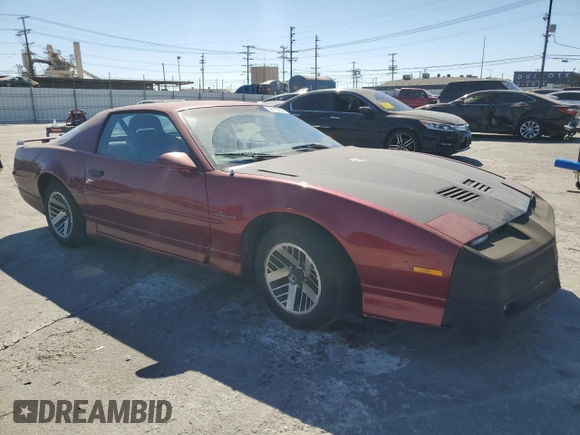 1990 Pontiac Firebird с VIN 1G2FS23T2LL206191, выставлен на аукционе Copart как лот 76175064 с пробегом 103 903 миль миль и Списание • Salvage title. История ставок и продаж доступна на DreamBid. Изображение 4.