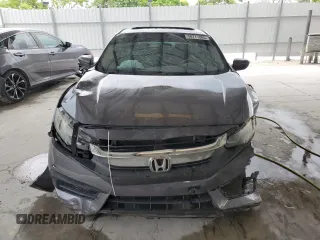2017 Honda Civic LX with VIN 19XFC2F56HE206118, listed as a Copart auction lot 58777885 with 59,710 mi miles and Salvage title. Bid and sale history available at DreamBid. Image 5.