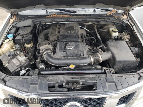 2010 Nissan Frontier SE with VIN 1N6AD0EV2AC405609, listed as a Copart auction lot 87615465 with 170,555 mi miles and Salvage title. Bid and sale history available at DreamBid. Image 11.