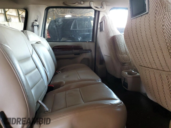 2002 Ford Excursion Limited с VIN 1FMNU42S32EB52470, выставлен на аукционе Copart как лот 47244495 с пробегом 218 302 миль миль и Списание • Salvage title. История ставок и продаж доступна на DreamBid. Изображение 10.