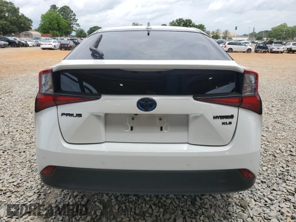 2021 Toyota Prius L Eco with VIN JTDKAMFU4M3129824, listed as a Copart auction lot 57788635 with 38,556 mi miles and Salvage title. Bid and sale history available at DreamBid. Image 6.