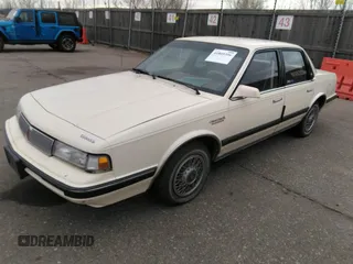 1990 Oldsmobile Cutlass Ciera with VIN 1G3AM54N4L6331841, listed as a IAAI auction lot 41805396 with 145,041 mi miles and . Bid and sale history available at DreamBid. Image 2.