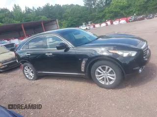 2016 Infiniti QX70 with VIN JN8CS1MU7GM670985, listed as a IAAI auction lot 42290094 with 154,588 mi miles and . Bid and sale history available at DreamBid. Image 13.