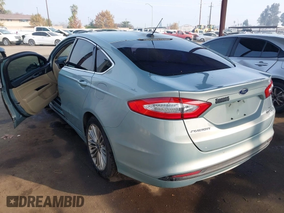 2014 Ford Fusion SE Hybrid with VIN 3FA6P0LU8ER283409, listed as a IAAI auction lot 40984629 with 206,605 mi miles. Bid and sale history available at carsss.com. Image 3.