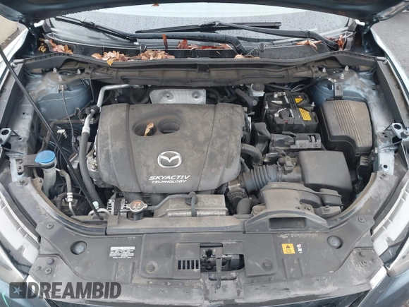 2015 Mazda CX-5 Grand Touring with VIN JM3KE4DY0F0493969, listed as a IAAI auction lot 41581885 with 71,014 mi miles. Bid and sale history available at carsss.com. Image 10.