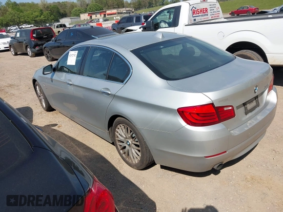 2011 BMW 5 Series 535i xDrive with VIN WBAFU7C58BC777569, listed as a IAAI auction lot 42072702 with 195,675 mi miles. Bid and sale history available at carsss.com. Image 3.