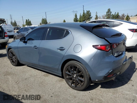 2022 Mazda 3 Premium with VIN JM1BPAML8N1511424, listed as a Copart auction lot 57108135 with 52,791 mi miles and Salvage title. Bid and sale history available at DreamBid. Image 2.