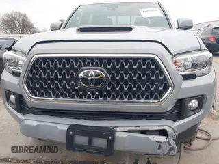 2018 Toyota Tacoma SR5 with VIN 5TFAZ5CNXJX065431, listed as a IAAI auction lot 41491056 with 39,024 mi miles and . Bid and sale history available at DreamBid. Image 6.