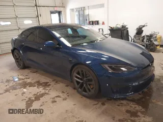 2021 Tesla Model S Plaid with VIN 5YJSA1E6XMF439884, listed as a IAAI auction lot 41622750 with 1 mi miles. Bid and sale history available at carsss.com. Image 1.