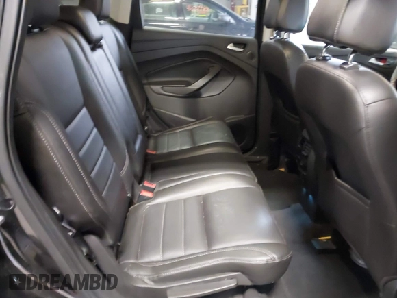 2015 Ford Escape Titanium z VIN 1FMCU0JX9FUB48089, wystawiony jako IAAI lot #41048127 z przebiegiem 133 439 mil mil oraz . Historia ofert i sprzedaży dostępna na DreamBid. Obrazek 8.