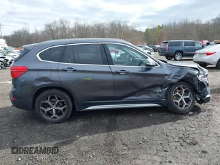 2017 BMW X1 xDrive28i with VIN WBXHT3Z39H4A57753, listed as a IAAI auction lot 41726790 with 52,509 mi miles. Bid and sale history available at carsss.com. Image 13.