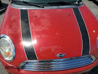 2011 MINI Hardtop z VIN WMWSU3C5XBT093162, wystawiony jako Copart lot #54871315 z przebiegiem 171 220 mil mil oraz Szkody całkowita. Historia ofert i sprzedaży dostępna na DreamBid. Obrazek 11.