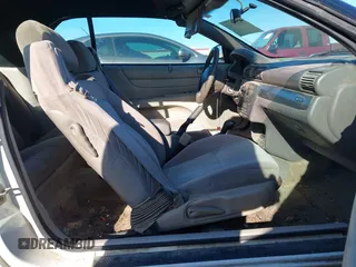 2005 Chrysler Sebring GTC with VIN 1C3EL75R55N613856, listed as a IAAI auction lot 41820747 with Not Provided miles and . Bid and sale history available at DreamBid. Image 5.