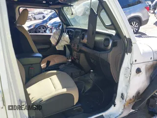 2020 Jeep Gladiator Sport S with VIN 1C6HJTAG3LL109494, listed as a IAAI auction lot 40677949 with 52,079 mi miles and . Bid and sale history available at DreamBid. Image 5.