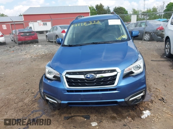 2017 Subaru Forester Touring with VIN JF2SJAWC7HH455648, listed as a IAAI auction lot 42118358 with 58,123 mi miles and . Bid and sale history available at DreamBid. Image 13.
