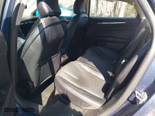 2018 Ford Fusion Hybrid Titanium with VIN 3FA6P0RUXJR151320, listed as a IAAI auction lot 41706229 with 275,101 mi miles. Bid and sale history available at carsss.com. Image 8.