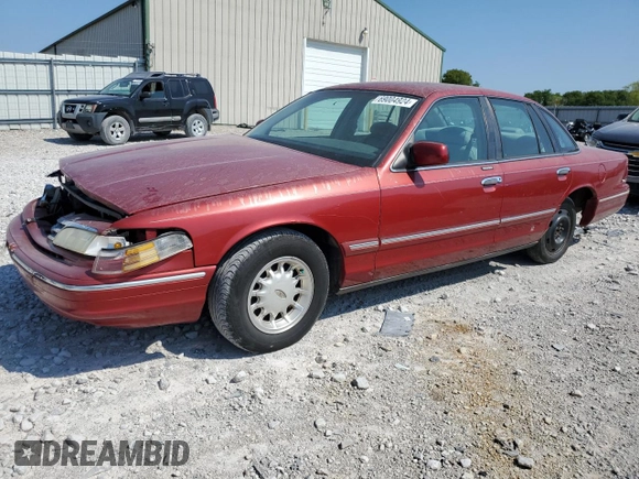 1997 Ford Crown Victoria LX с VIN 2FALP74W7VX148869, выставлен на аукционе Copart как лот 69004924 с пробегом 226 648 миль миль и Списание • Salvage title. История ставок и продаж доступна на DreamBid. Изображение 1.