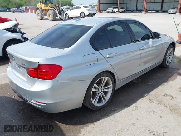 2014 BMW 3 Series 328i xDrive with VIN WBA3B5C51EP543588, listed as a IAAI auction lot 42105211 with 117,717 mi miles and . Bid and sale history available at DreamBid. Image 4.