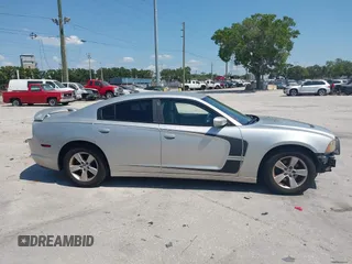 2012 Dodge Charger SE with VIN 2C3CDXBG5CH119493, listed as a IAAI auction lot 42126739 with 138,464 mi miles and . Bid and sale history available at carsss.com. Image 14.